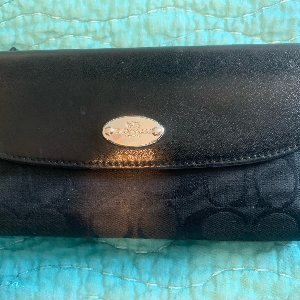 Black coach billfold wallet. Like new.